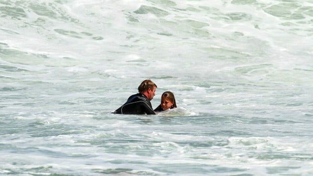 TajBurrowSavesKidSurfer